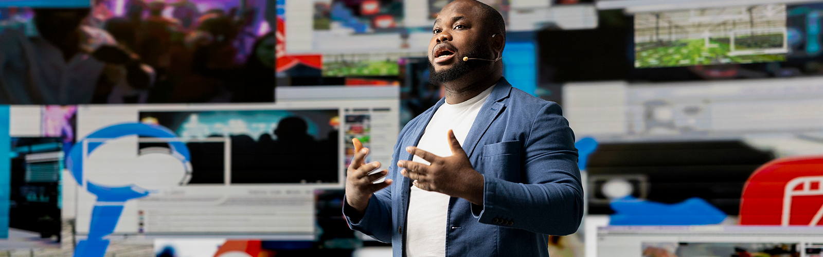 Person onstage presenting at an event
